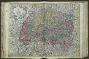 Offenes Buch mit detaillierter Karte von Deutschlands Regionen.