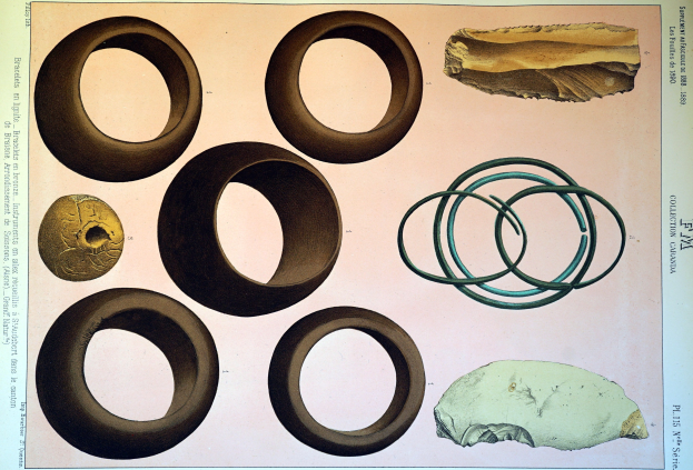 Ein Blatt Papier mit verschiedenen Arten von Gummi-O-Ringen und Gegenständen darauf, neben Text, der wahrscheinlich ihre Größen und Formen beschreibt.